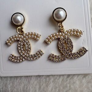 CHANEL Gold and Cream Pearl Logo Earrings